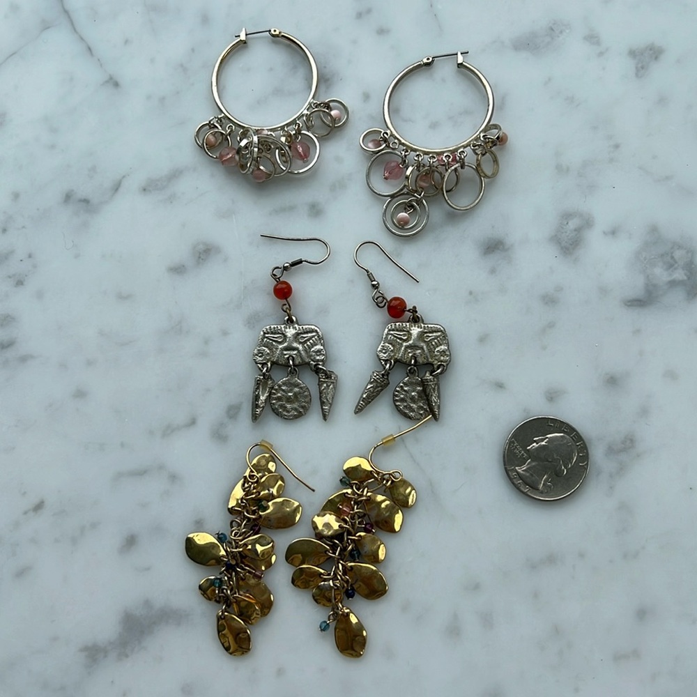 Three pair of dangling earrings. From the 2000’s